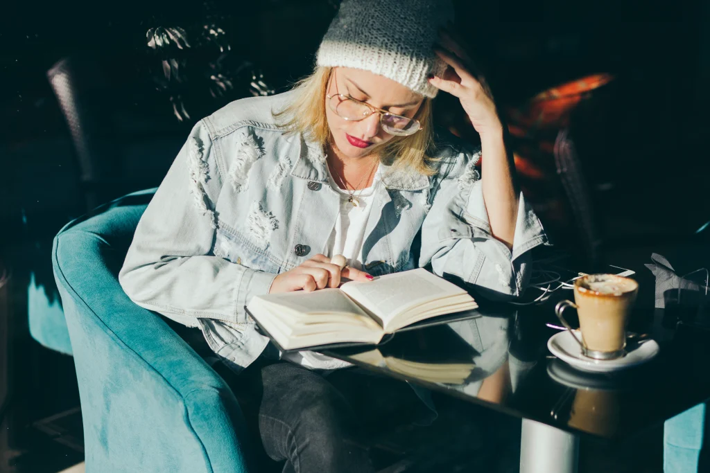 stylish-woman-reading-cafe
